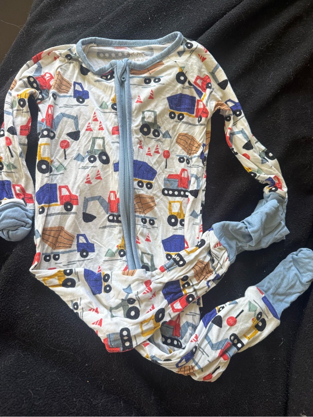 Little Sleepies Construction Truck Footed Pajamas in Blue Trim